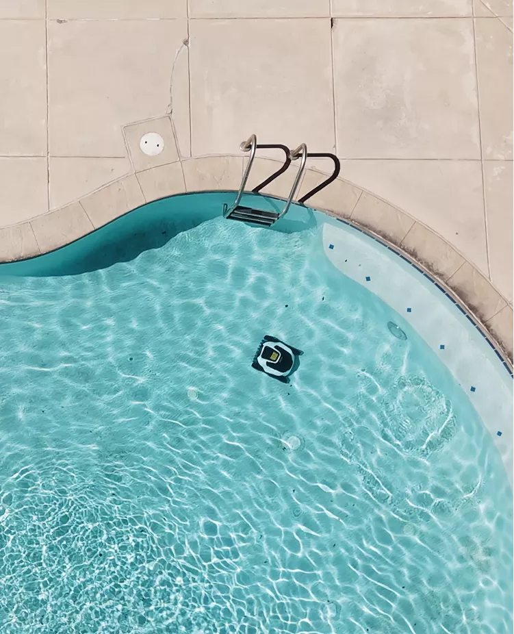 SPINO E1 in a backyard pool